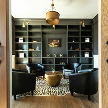 living room in house with large bookshelves